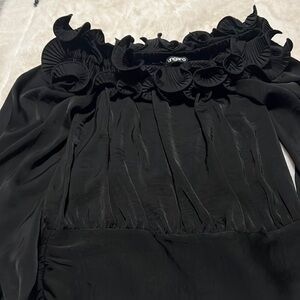 Stunning blouse with beautiful detailed neckline and fitted waist